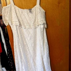 I'm selling this cute white dress it have a zip up in the back.